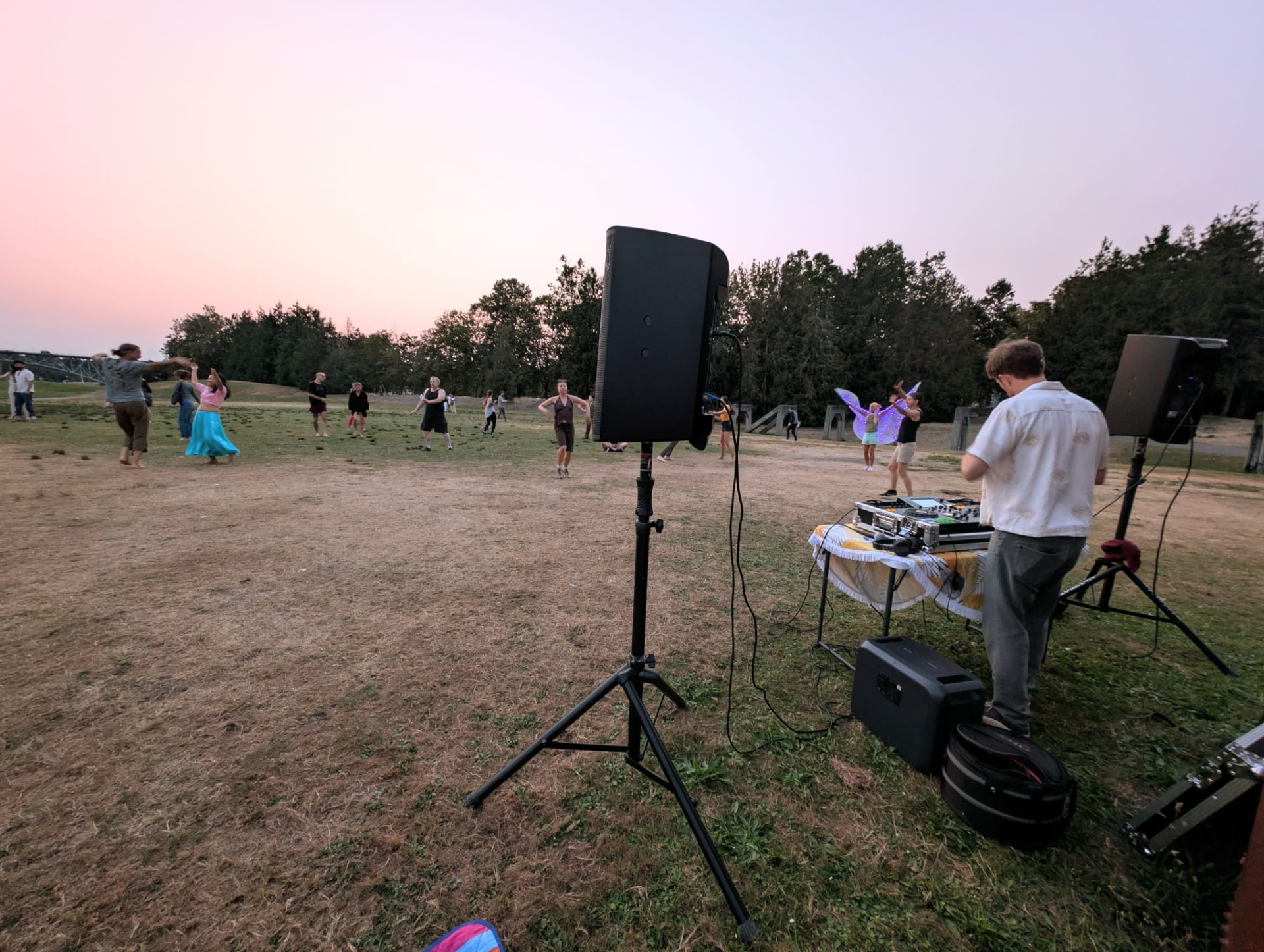 Dancers gathered on the hill at Gas Works Park at sunset